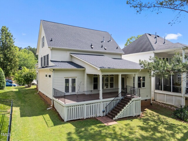 back of house with a lawn, a shingled roof, stairway, crawl space, and french doors