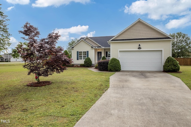 100 Jonathans Pl, Goldsboro, NC 27534 - ranch-style home with driveway, a front yard, and a garage
