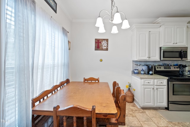 100 Jonathans Pl, Goldsboro, NC 27534 - dining area with a chandelier, plenty of natural light, and ornamental molding