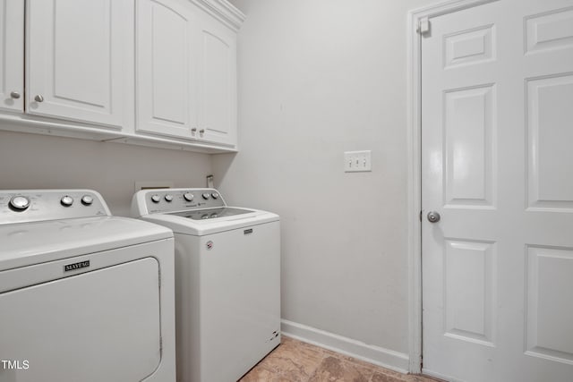 100 Jonathans Pl, Goldsboro, NC 27534 - washroom featuring washing machine and clothes dryer, baseboards, and cabinet space