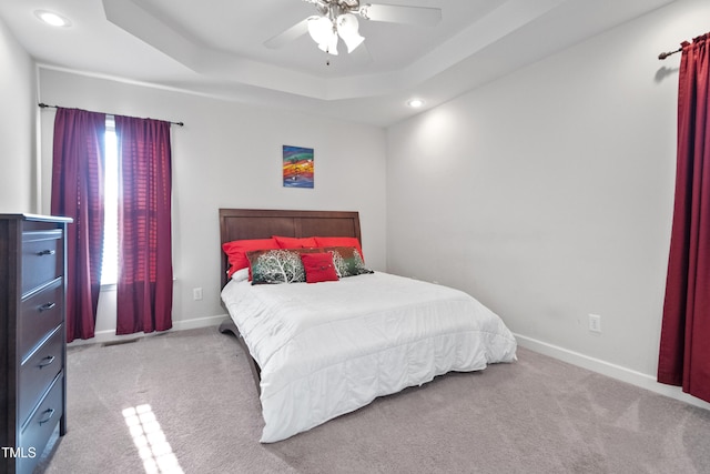 100 Jonathans Pl, Goldsboro, NC 27534 - bedroom with recessed lighting, carpet, a tray ceiling, baseboards, and a ceiling fan