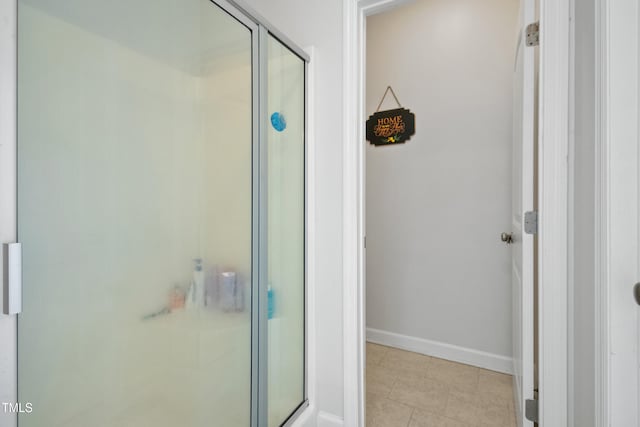 100 Jonathans Pl, Goldsboro, NC 27534 - full bathroom with baseboards, a stall shower, and tile patterned flooring