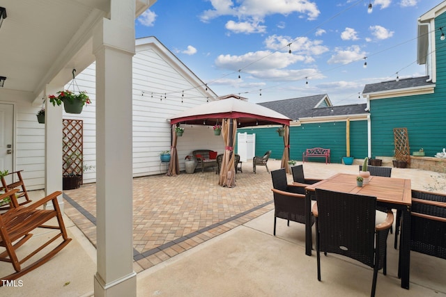 view of patio / terrace featuring a gazebo and outdoor dining area