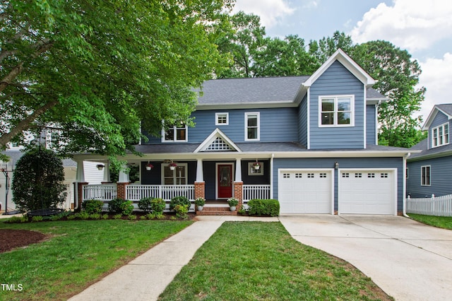view of front of property with a garage, a porch, driveway, and roof with shingles