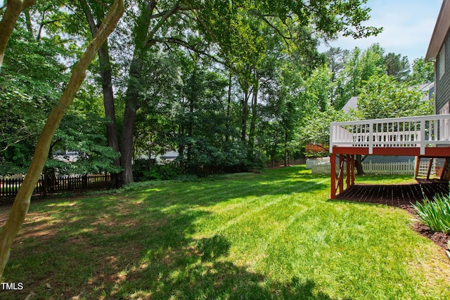 view of yard featuring a deck