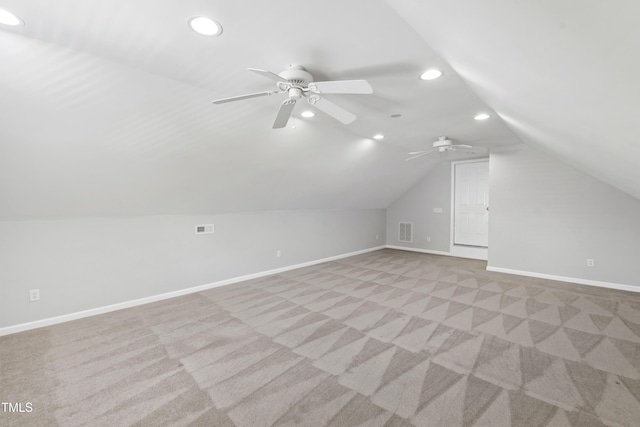 bonus room with recessed lighting, vaulted ceiling, light carpet, baseboards, and a ceiling fan