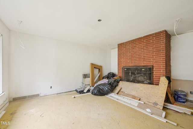 unfurnished living room featuring a fireplace