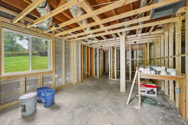 miscellaneous room with concrete flooring