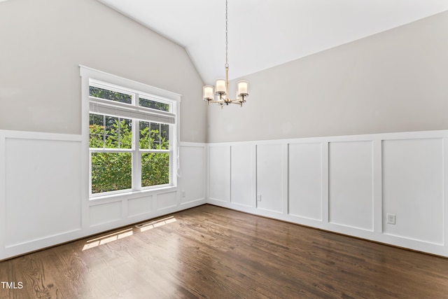 3914 Old Chapel Hill Rd, Durham, NC 27707 - spare room featuring a decorative wall, a chandelier, wood finished floors, vaulted ceiling, and a wainscoted wall