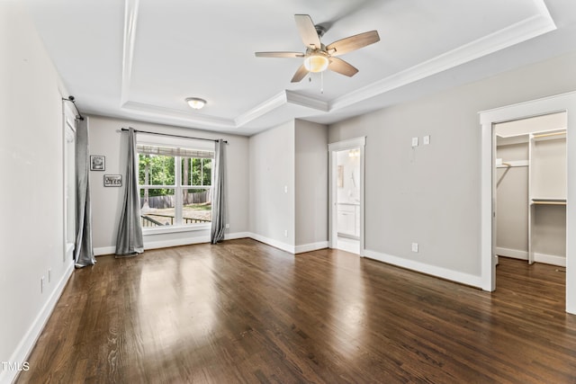 3914 Old Chapel Hill Rd, Durham, NC 27707 - unfurnished bedroom featuring a raised ceiling, wood finished floors, ornamental molding, baseboards, and a spacious closet