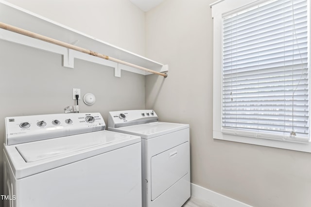 3914 Old Chapel Hill Rd, Durham, NC 27707 - clothes washing area with separate washer and dryer and baseboards