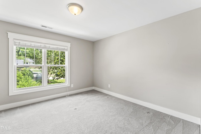 3914 Old Chapel Hill Rd, Durham, NC 27707 - carpeted spare room featuring baseboards