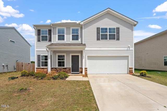 637 Marrian Dr, Clayton, NC 27520 - view of front of home featuring an attached garage, driveway, and stone siding