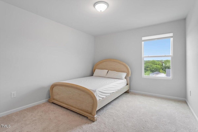 637 Marrian Dr, Clayton, NC 27520 - carpeted bedroom featuring baseboards