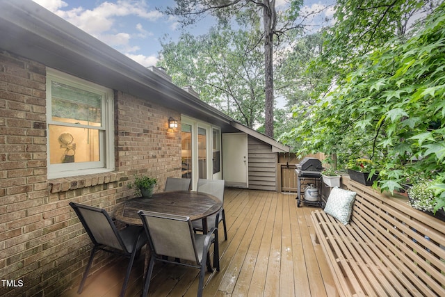 200 W Woodcroft Pkwy Unit 57B, Durham, NC 27713 - wooden deck featuring outdoor dining area and grilling area
