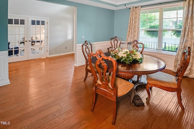 82 Idlewood Ln, Clayton, NC 27527 - dining area featuring light wood-style floors, french doors, and ornamental molding