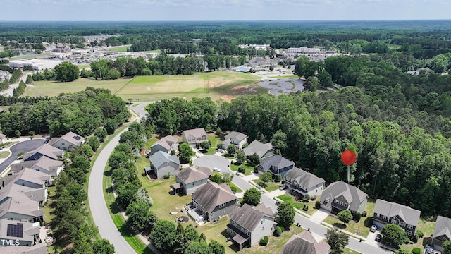 82 Idlewood Ln, Clayton, NC 27527 - aerial overview of property's location featuring a heavily wooded area and nearby suburban area