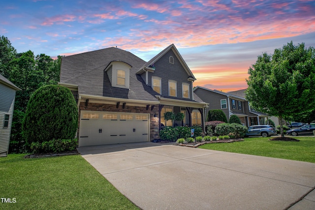 82 Idlewood Ln, Clayton, NC 27527 - view of front of house with a yard, concrete driveway, a garage, and roof with shingles