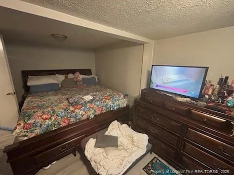 bedroom with a textured ceiling