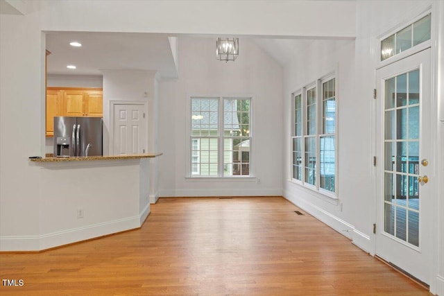 6335 Cedar Waters Dr, Raleigh, NC 27607 - unfurnished dining area featuring light wood-type flooring, baseboards, recessed lighting, and a chandelier