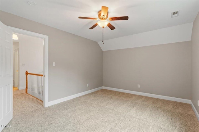 6335 Cedar Waters Dr, Raleigh, NC 27607 - additional living space featuring light colored carpet, ceiling fan, baseboards, and vaulted ceiling