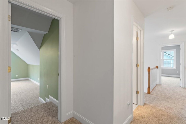 6335 Cedar Waters Dr, Raleigh, NC 27607 - hallway featuring carpet floors, baseboards, and an upstairs landing