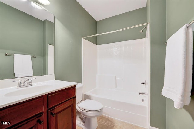 bathroom with toilet, vanity, and bathtub / shower combination