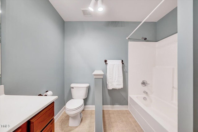 bathroom with shower / bath combination, toilet, vanity, and baseboards