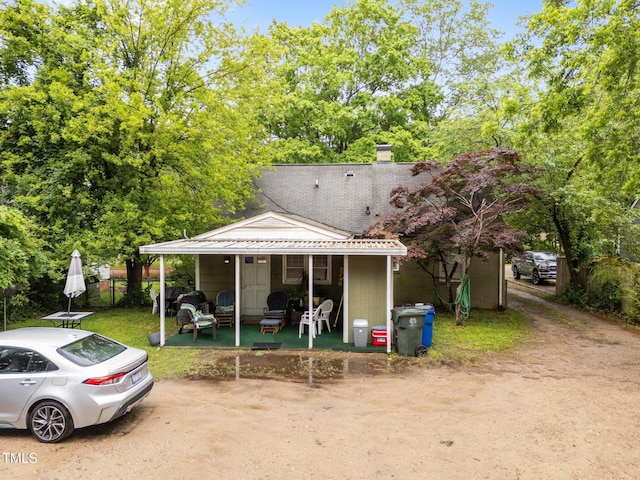 view of front of home with a chimney