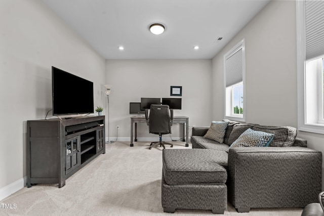 carpeted home office featuring healthy amount of natural light, baseboards, and recessed lighting