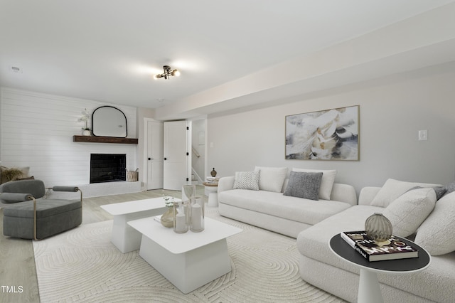 4307 Pope Rd, Durham, NC 27707 - living area featuring wood finished floors and a large fireplace
