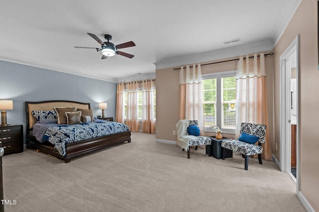 carpeted bedroom featuring crown molding, a ceiling fan, and baseboards