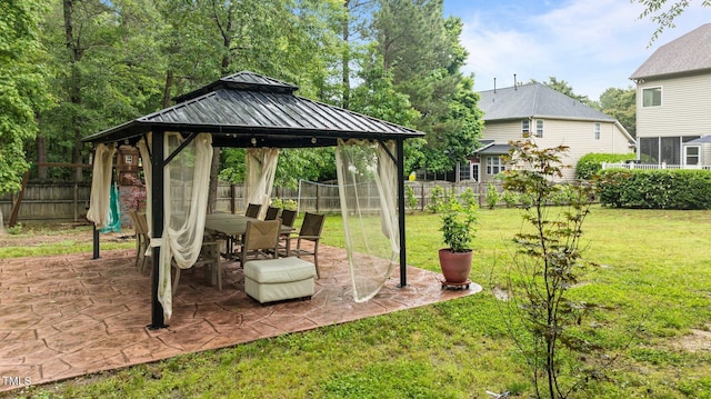 view of yard with a gazebo and a patio area