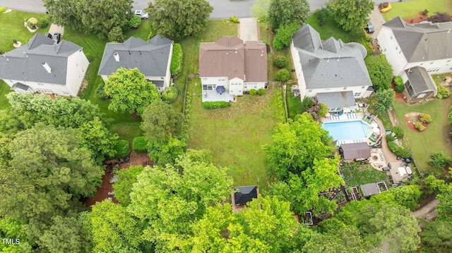 aerial view of residential area featuring a pool