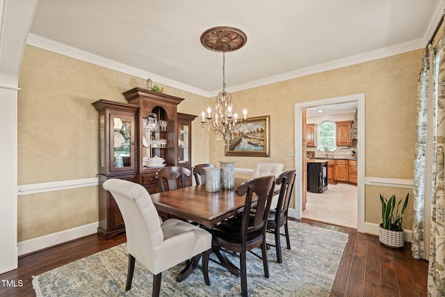 53 Lake Wendell Rd, Wendell, NC 27591 - dining area featuring wood-type flooring, a chandelier, and crown molding