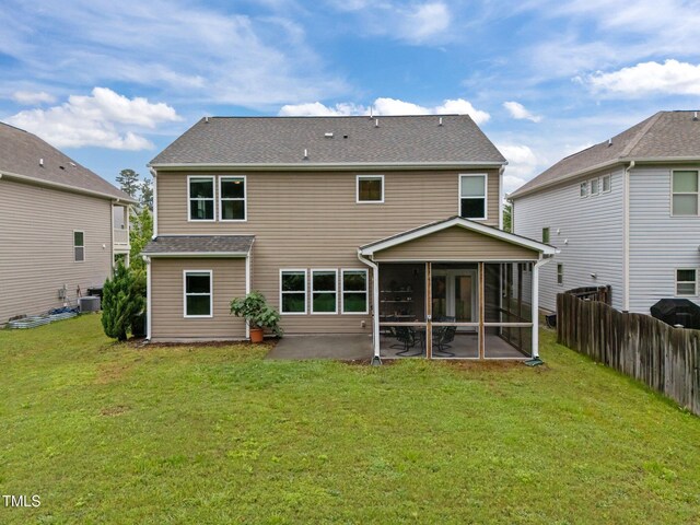 back of property featuring a sunroom, a patio area, and central AC unit