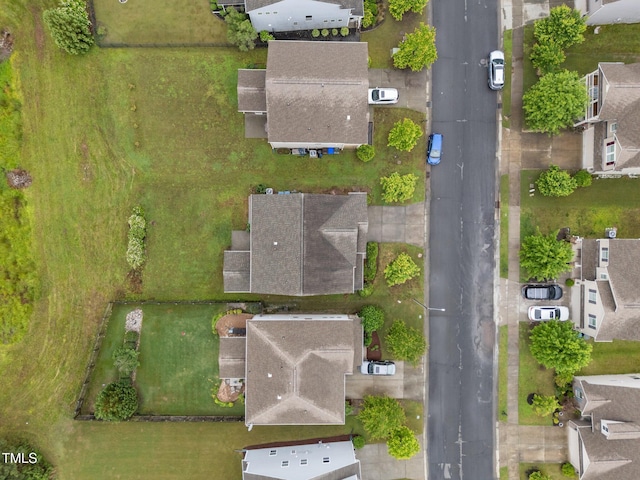 aerial view of property's location featuring nearby suburban area