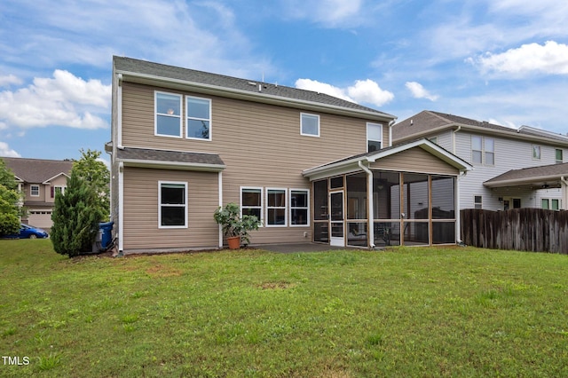 back of house with a sunroom