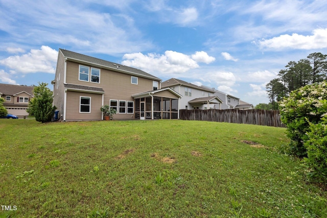 rear view of house with a sunroom