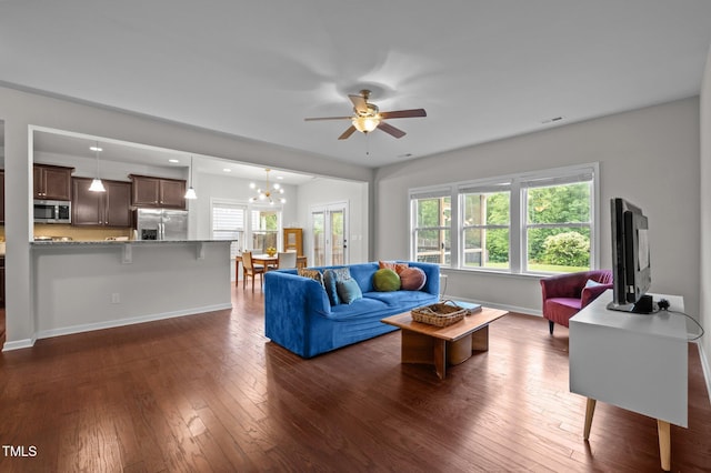 living area with ceiling fan, baseboards, dark wood-style floors, and recessed lighting