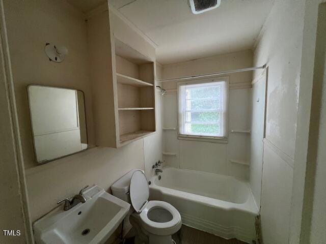 246 Keene St, Henderson, NC 27536 - full bath featuring a sink, toilet, and shower / bathtub combination
