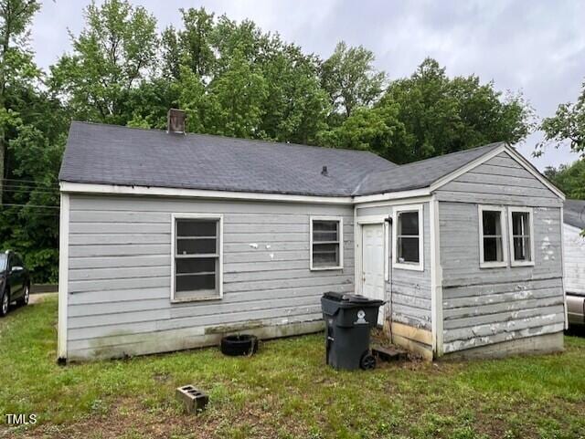 246 Keene St, Henderson, NC 27536 - back of property with a lawn