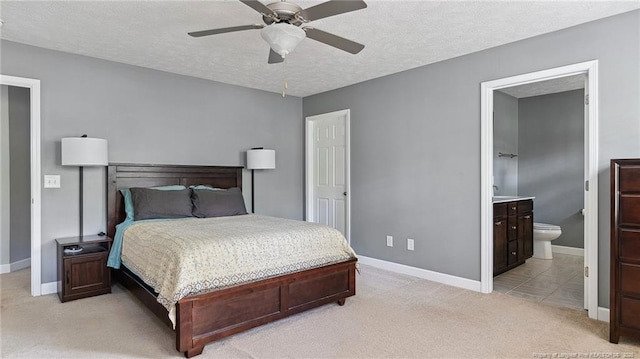 116 Argyll Ave, Aberdeen, NC 28315 - bedroom featuring light carpet, baseboards, a textured ceiling, and ceiling fan