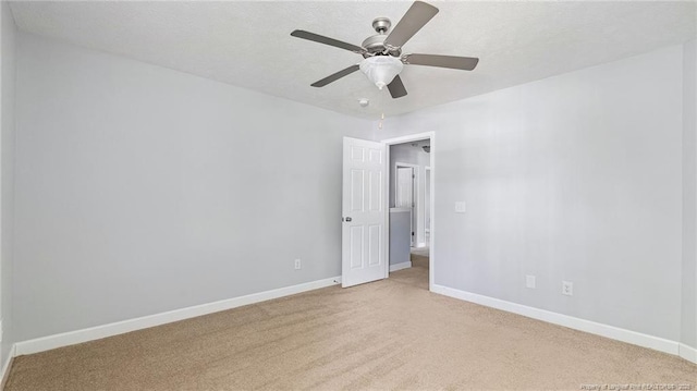 116 Argyll Ave, Aberdeen, NC 28315 - unfurnished room featuring light colored carpet, baseboards, and ceiling fan