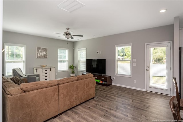living area with dark wood-style flooring, baseboards, ceiling fan, and recessed lighting