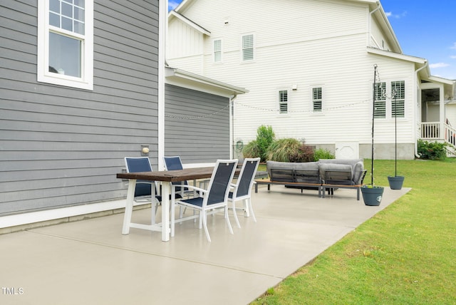 view of patio / terrace featuring outdoor dining space and an outdoor living space