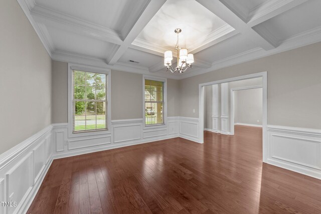 10 Stillwood Ct, Clayton, NC 27520 - spare room with a chandelier, coffered ceiling, beam ceiling, wood finished floors, and a wainscoted wall