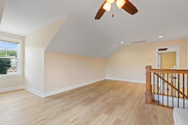 13 Nettletree Creek Ct, Youngsville, NC 27596 - additional living space with light wood-type flooring, lofted ceiling, a ceiling fan, baseboards, and recessed lighting