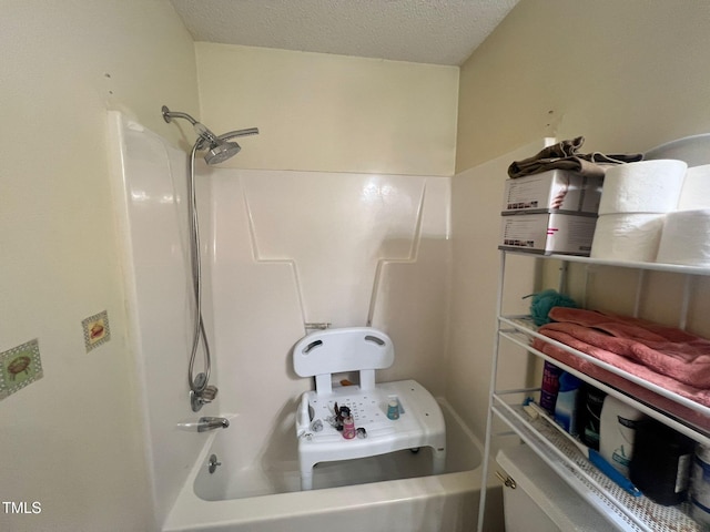 103 N Woods Rd, Henderson, NC 27536 - full bathroom with bathing tub / shower combination, a textured ceiling, and toilet