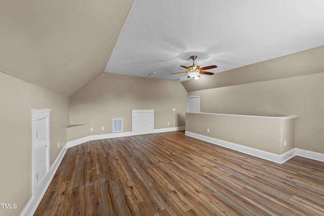 436 Edgepine Dr, Holly Springs, NC 27540 - bonus room featuring wood finished floors, lofted ceiling, a ceiling fan, and baseboards